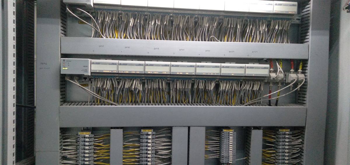 Allen-Bradley remote I/O control panel with dense labelled field wiring