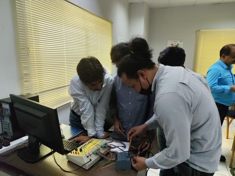 Hands-on PLC interfacing exercise with a control interface trainer