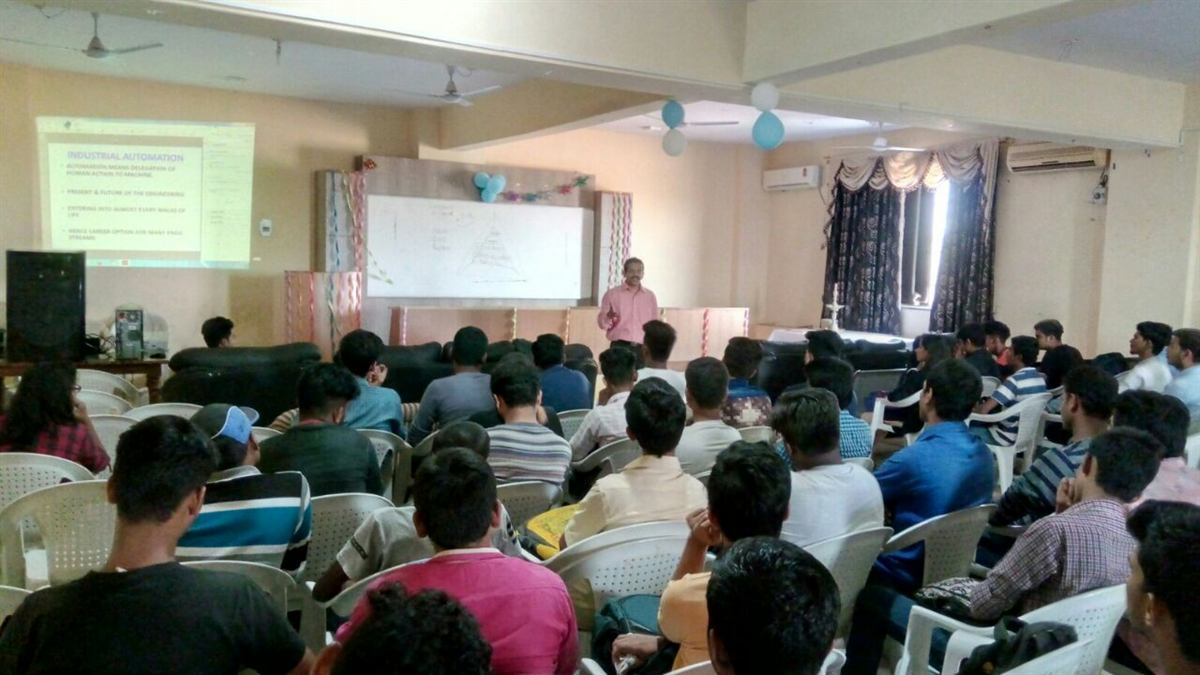 Industrial automation seminar for a hall full of engineering students